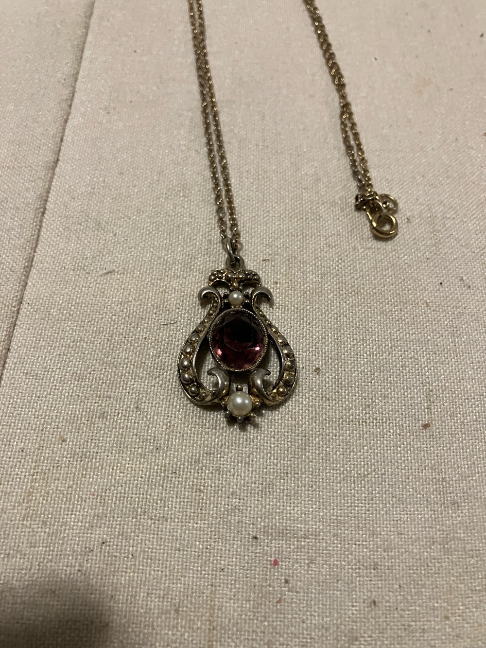 Vintage Avon. Great condition 28” gold tone chain with crest like piece with